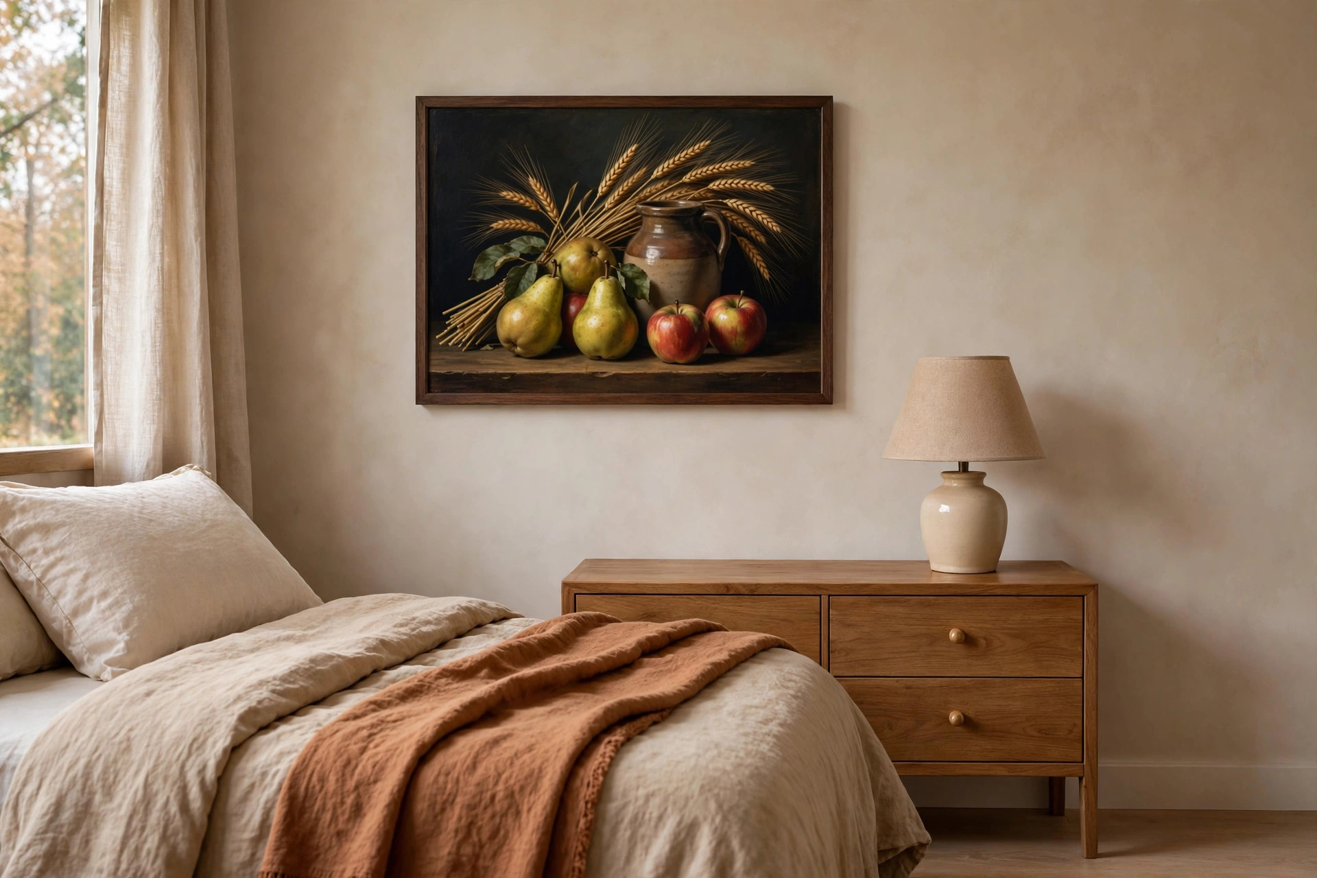 Framed still life painting of pears, apples, wheat, and a ceramic jug above a wood dresser